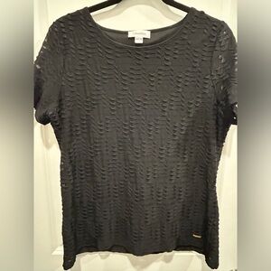 Calvin Klein - Ladies Size Large - Black top- lined with lace effect.